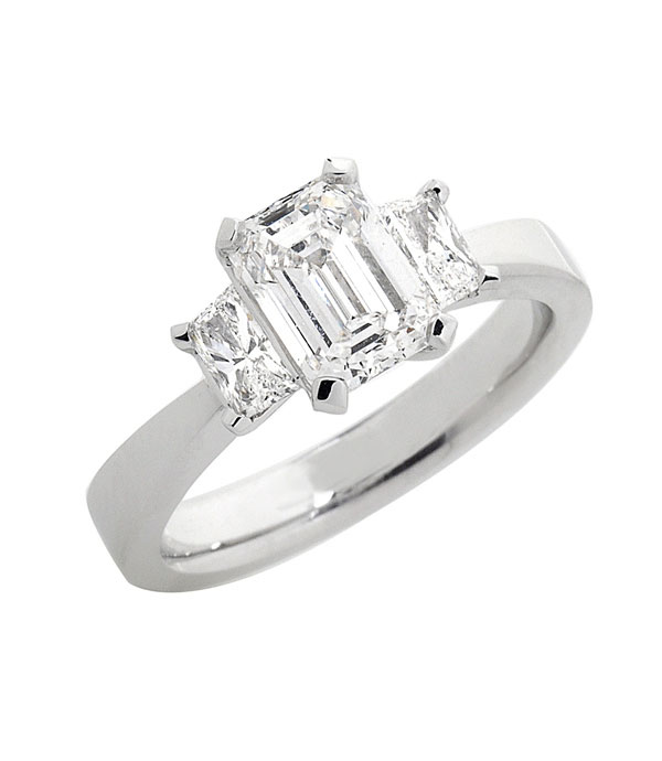 Emerald and Trapezoid Diamond Three Stone Ring