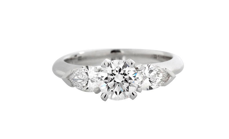 Round and Pear Shape Three Stone Diamond Ring