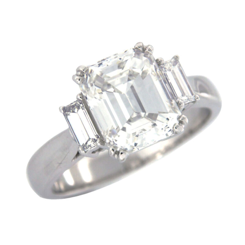 Emerald and Baguette Cut Three Stone Diamond Ring