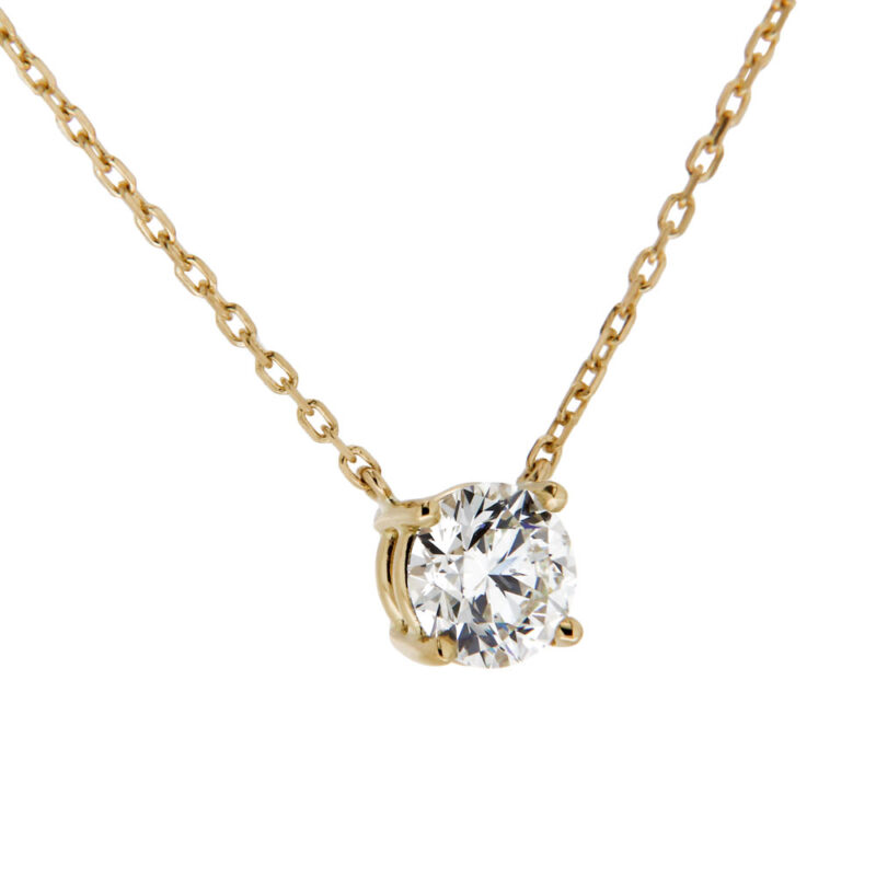Single diamond gold pendant